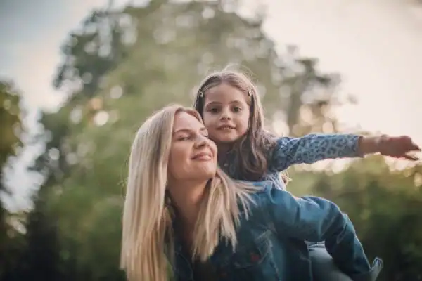 happy mum and daughter following mediation to resolve parental alienation Torquay